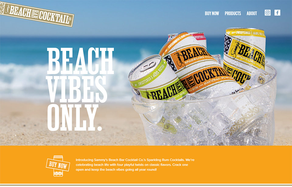 Sammy Hagar pictured on a beach, holding his newest cocktail